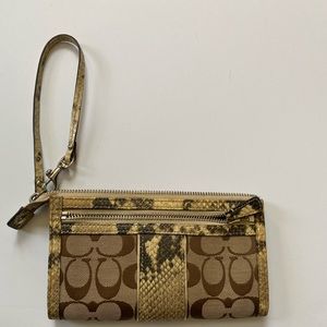 Coach wristlet 7.5 long 4.5 high expand 2.5 snake skin